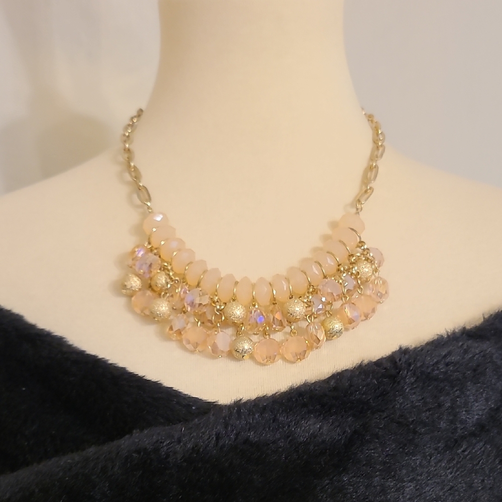 Elegant Gold and Peach Beaded Statement Necklace